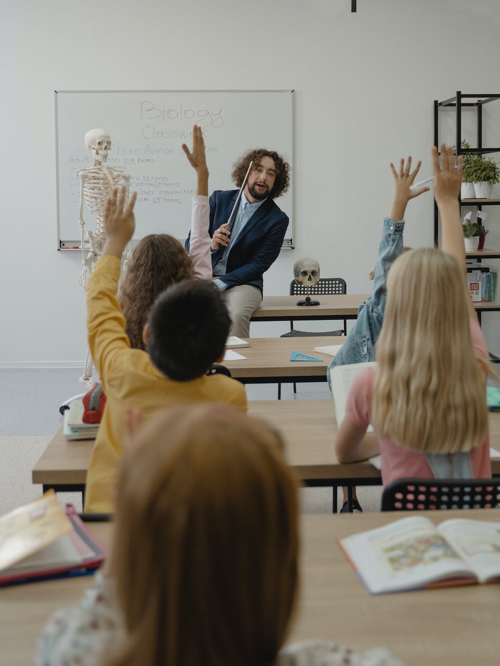 children inside a room participating in class